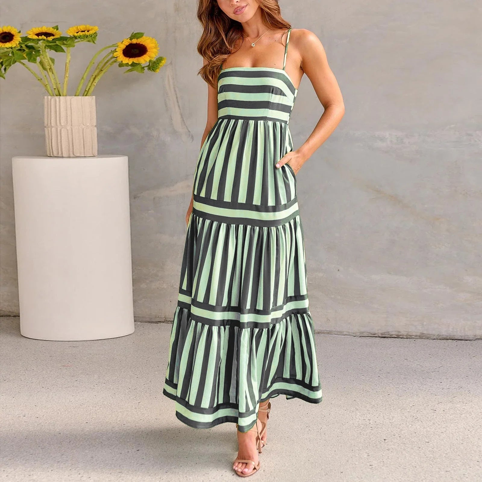 Stylish backless striped dress with square neckline, perfect for beach vacations