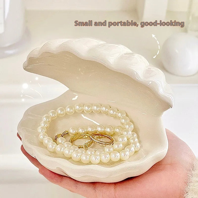 Yellow porcelain ornamental tray with optional night light, shown with white and pink shell options.