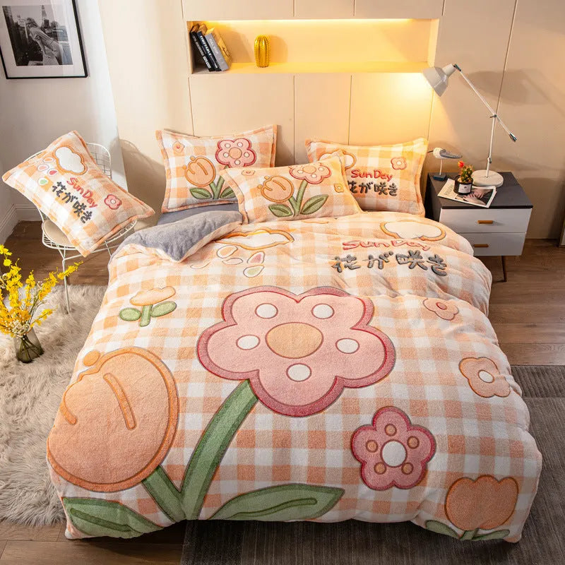 Four-piece milk velvet bedding set with quilt cover, bed sheet, and pillowcases in warm colour