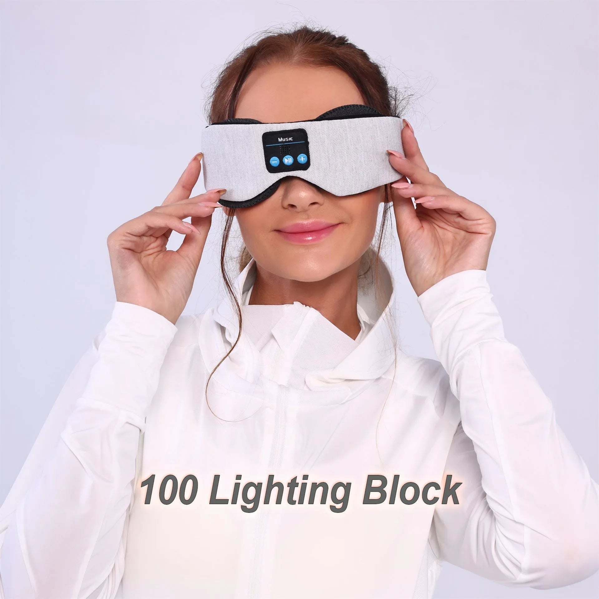 Grey contour Bluetooth sleeping eye mask with built-in speakers for wireless music playback.