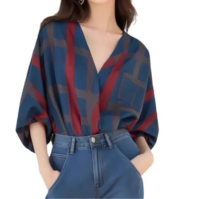 Women's loose-fit pullover top with painted pattern, short length, and drop-shoulder sleeves in polyester