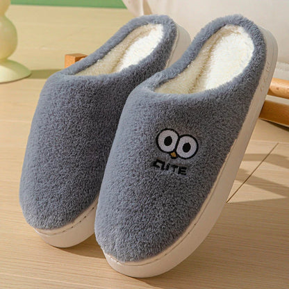 Cozy cartoon slippers with big eyes in various colors, featuring plush material and non-slip rubber soles for comfortable indoor wear