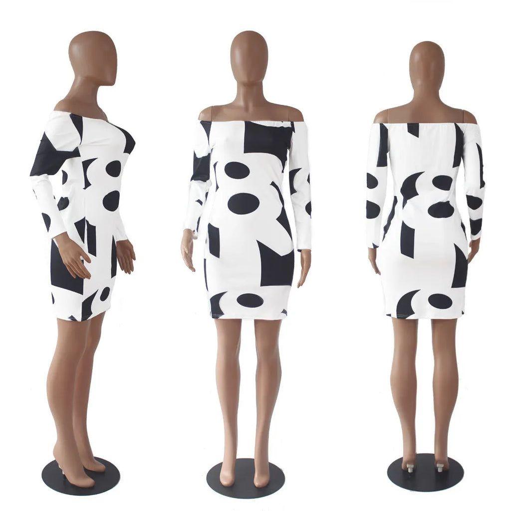 White long sleeve off-shoulder geometric print dress with lantern skirt and mid waist, standing front view