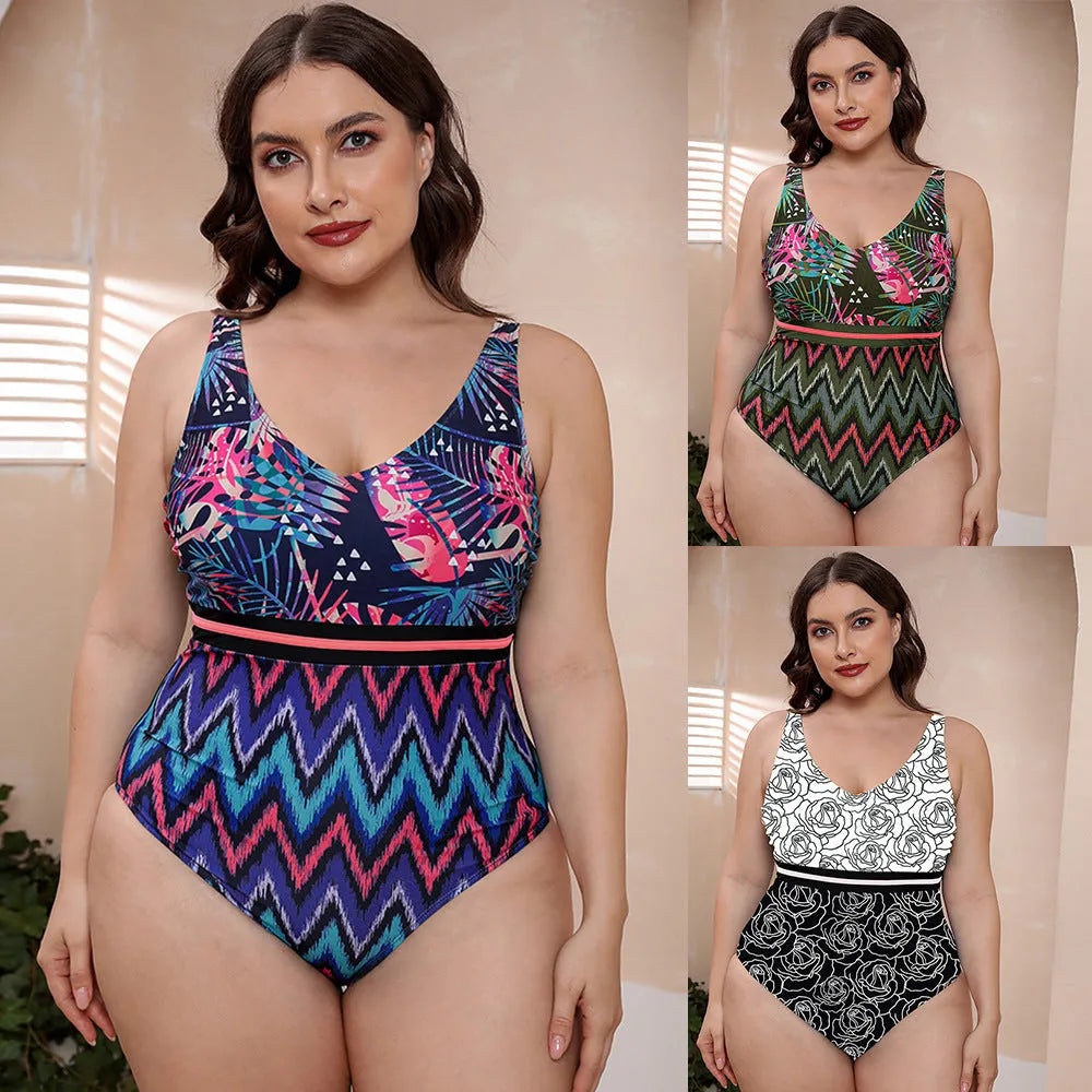 Women's blue printed one-piece swimsuit with spaghetti straps and a striped vest design laid flat.