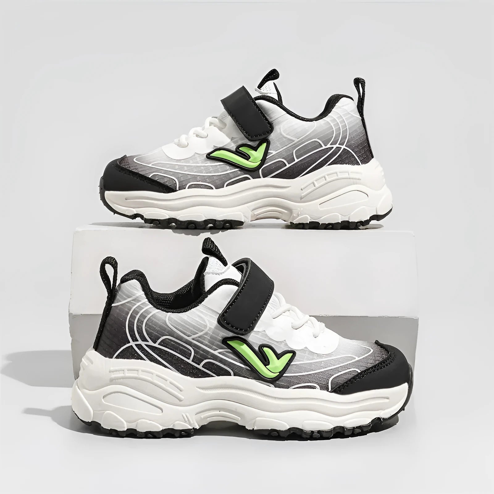 Children's black and purple striped dad shoes with lace-up front and rubber sole.
