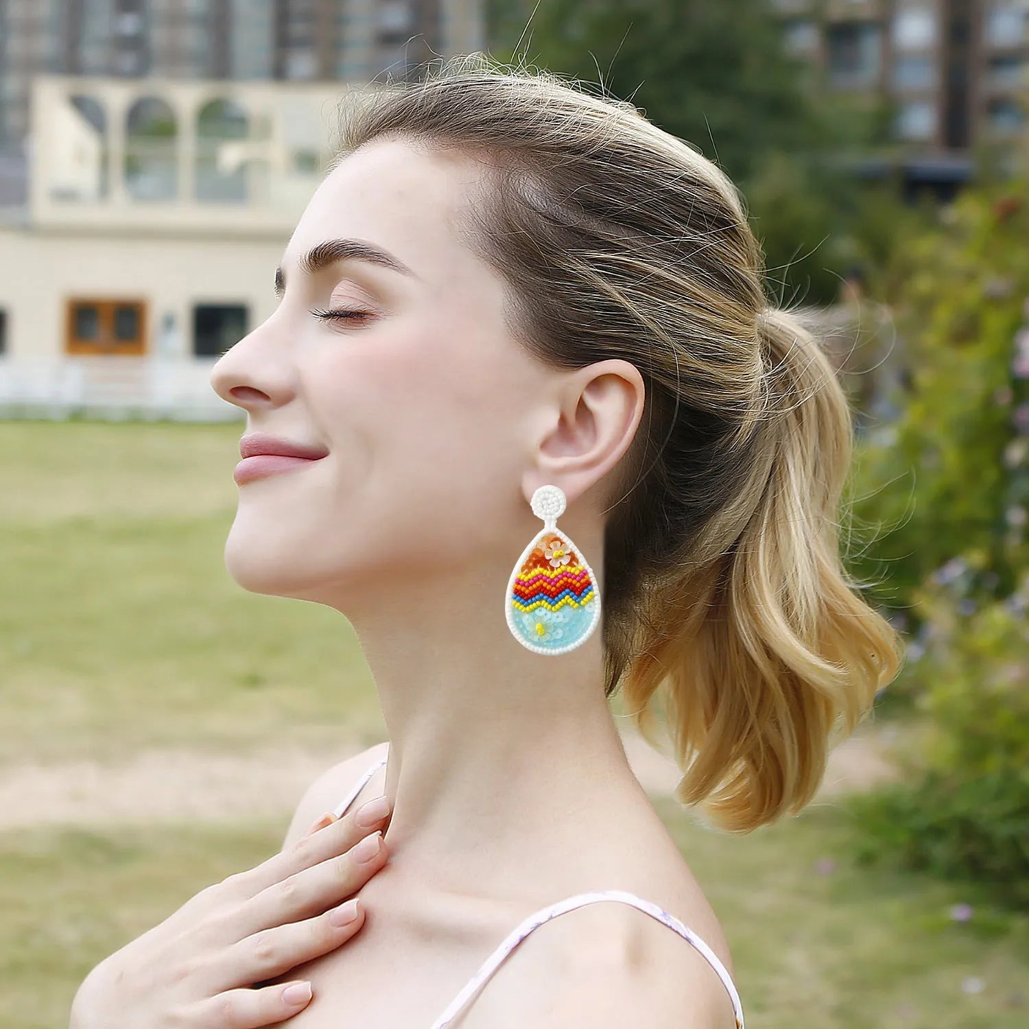 Hand-woven beaded drop earrings in geometric Easter egg shape, colour E69066, 6.7cm by 3.7cm