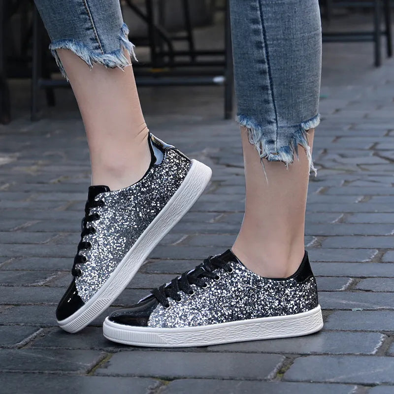 Women's black, pink, and gold sequined casual lace-up shoes with a round toe and leather lining.