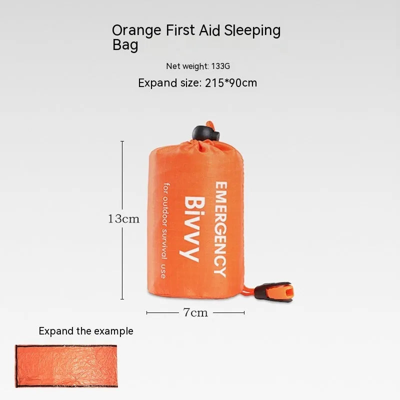 Emergency disaster relief tent kit with orange tent, sleeping bag, raincoat and safety whistle