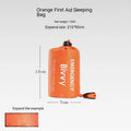 Emergency disaster relief tent kit with orange tent, sleeping bag, raincoat and safety whistle