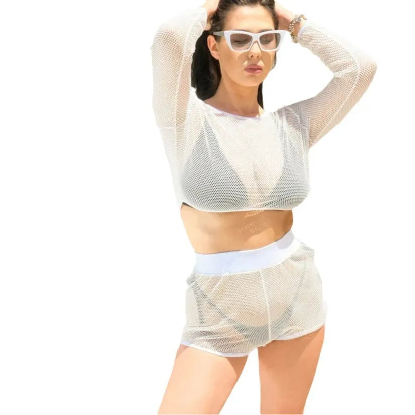 White transparent ladies' swimsuit top and skirt set for the beach.