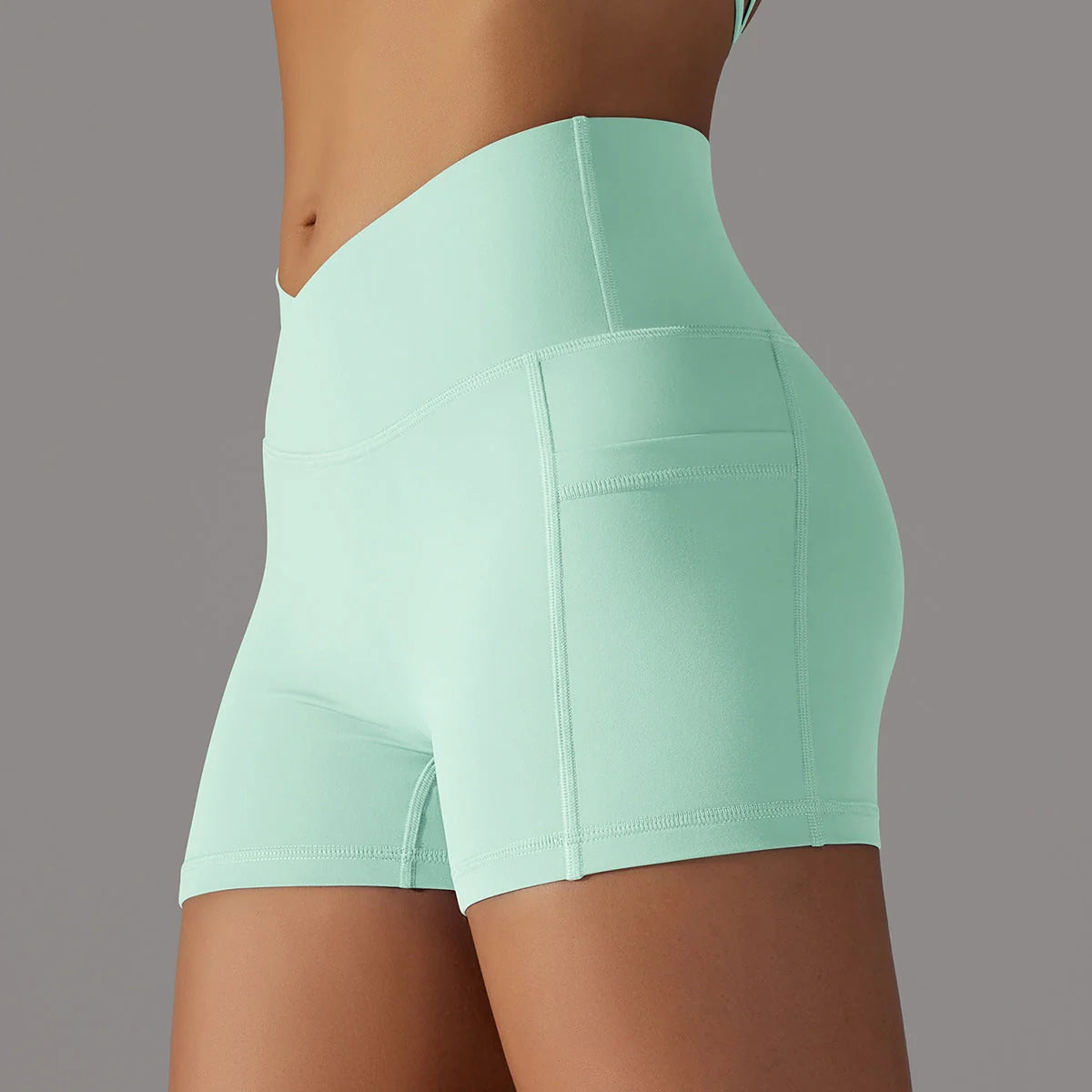 Women's yoga shorts with phone pocket in various colours, ideal for fitness and workouts