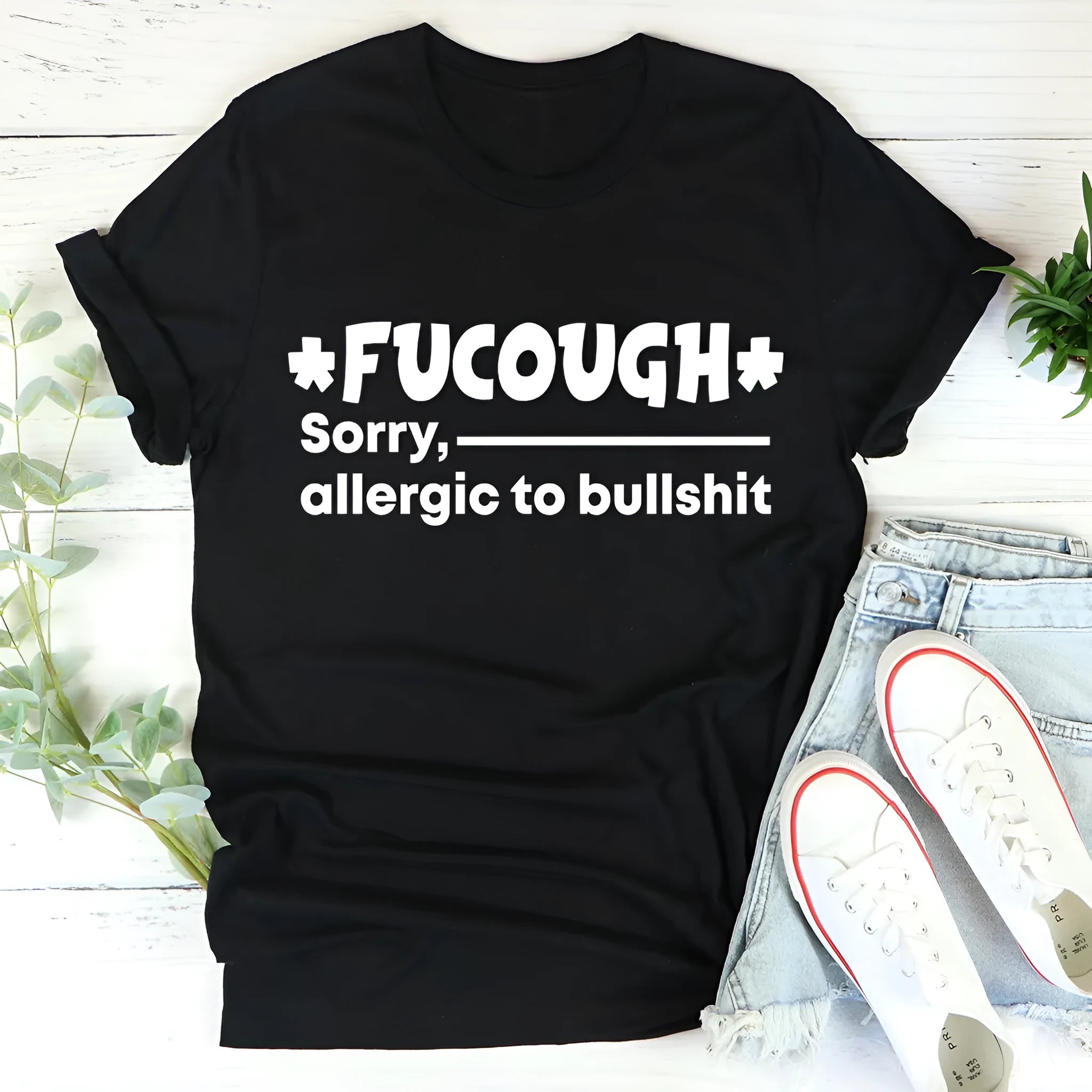 Black cotton short sleeve T-shirt with round neck and loose fit straight cut design