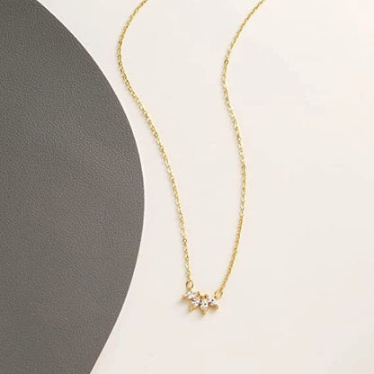 Minimalist lotus flower petal necklace in gold and silver, perfect for parties and everyday wear