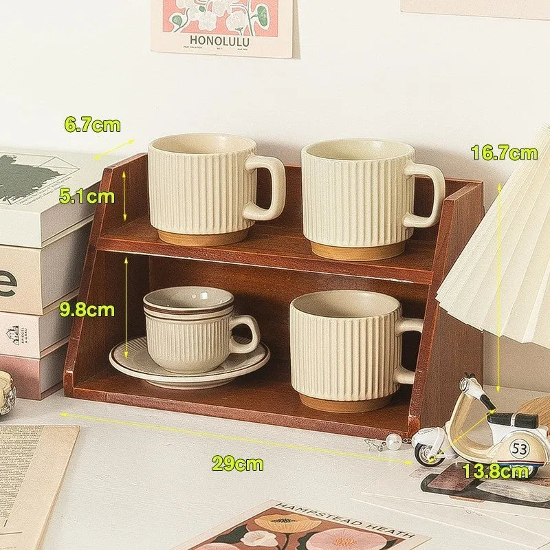 Solid wood multi-layer cup storage box in wood tone, with three layers for organising mugs and cups.