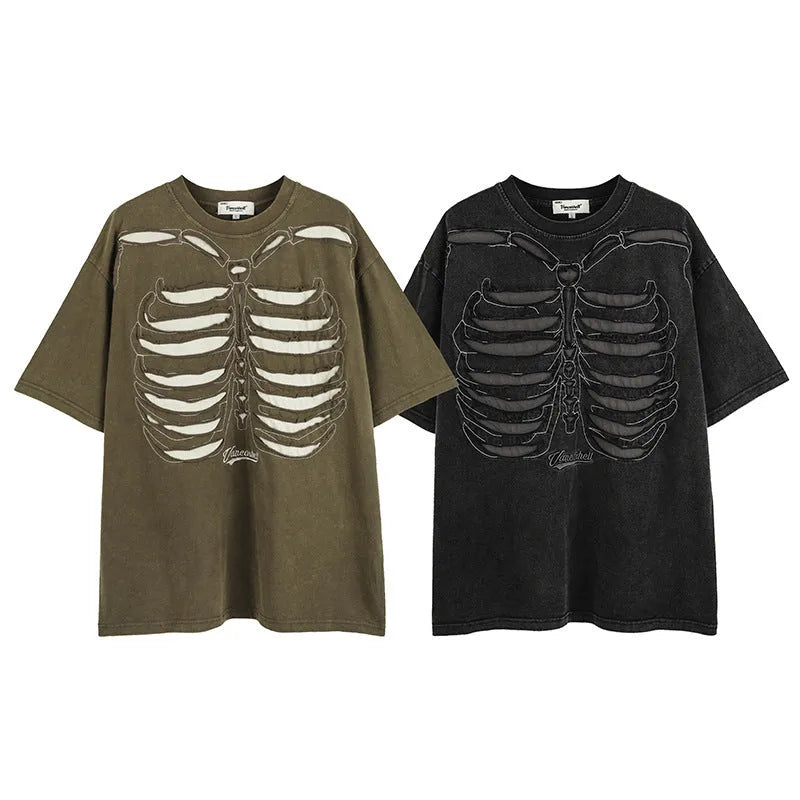 Man wearing a brown loose-fit cotton t-shirt with a large graphic skull print on the front.