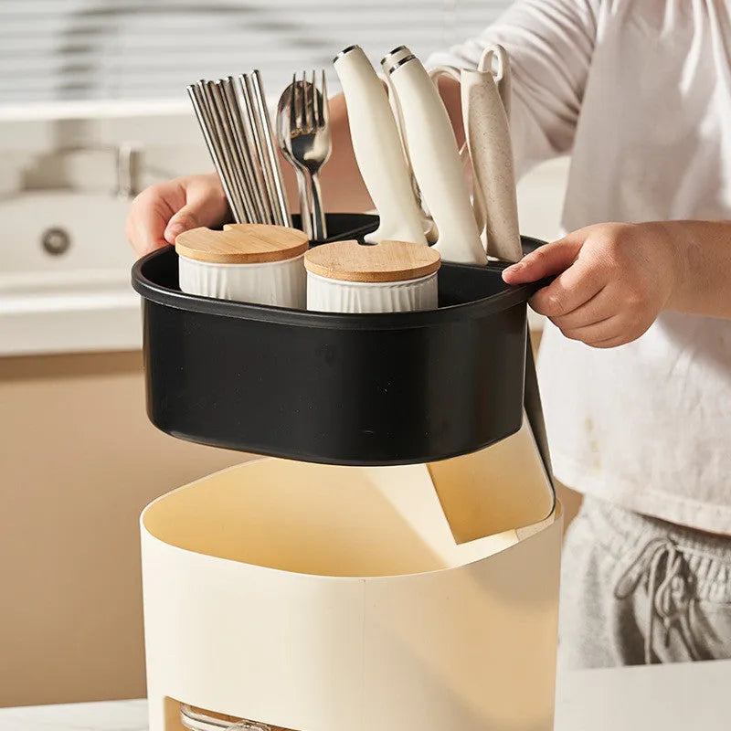 White rotating kitchen storage bucket set with a separate four-compartment spice box for cutlery and utensil organisation.