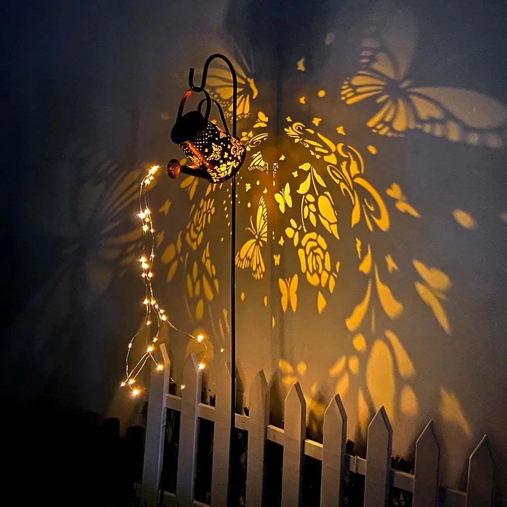 Iron solar garden lamp with pastoral butterfly pattern and warm white LED light.
