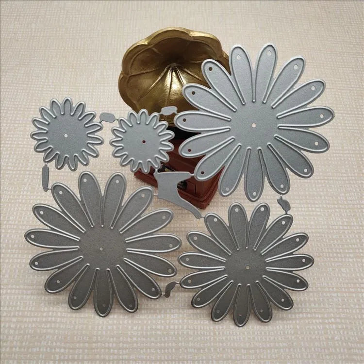 Silver high carbon steel cutting mold with etched flower decoration measuring 12.5x13 cm