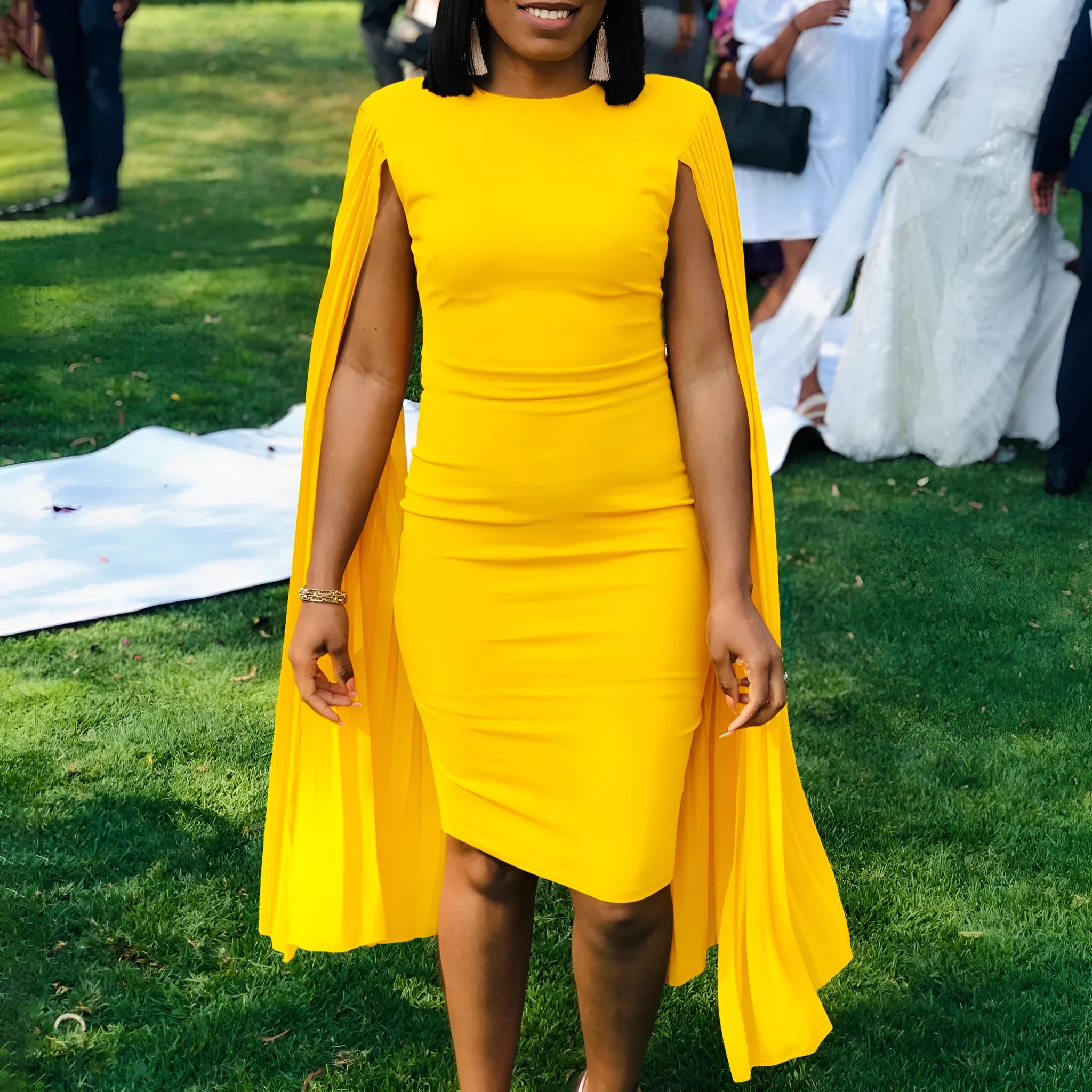 Long sleeve high waist evening gown with a pleated shawl in yellow, orange, red, or green