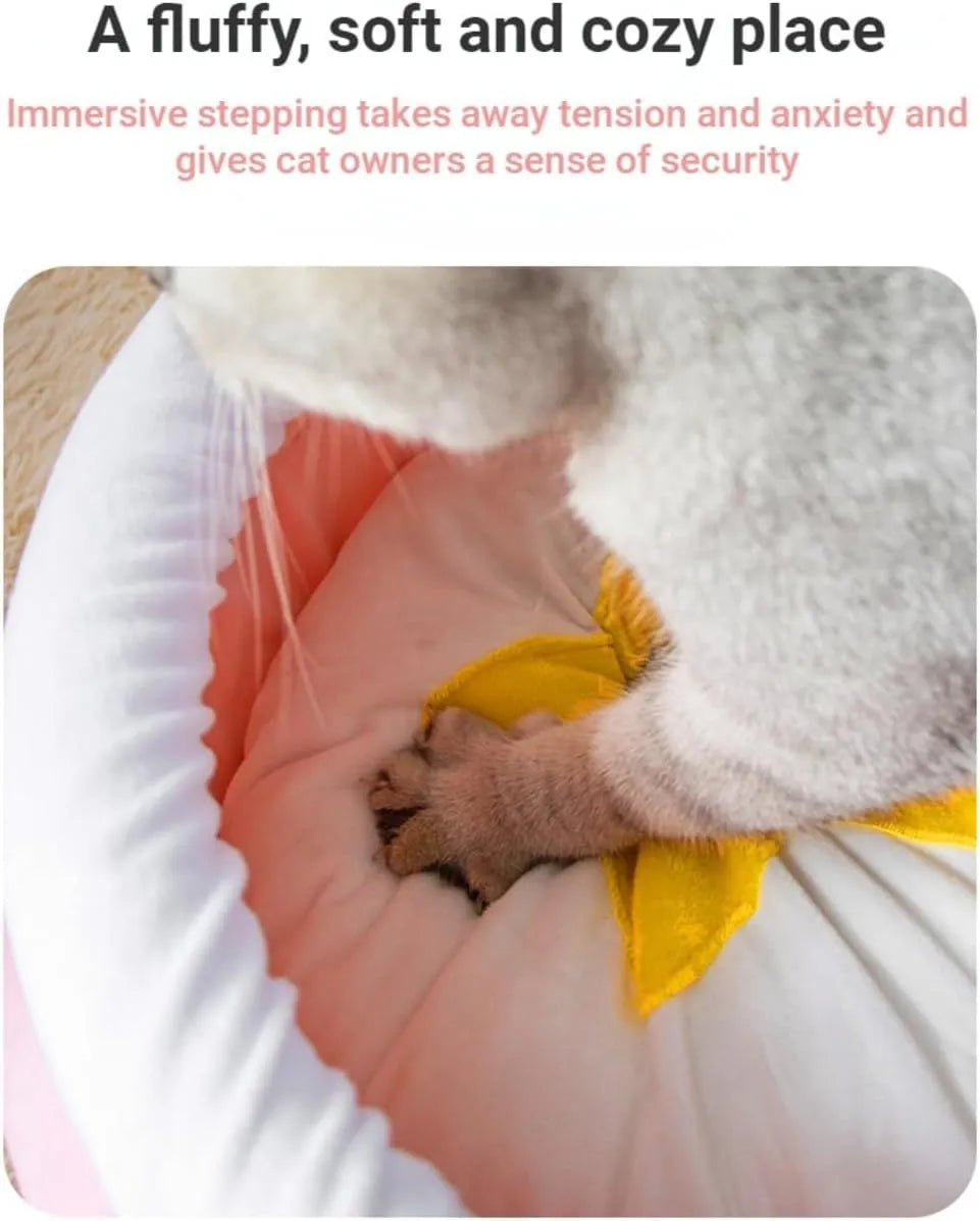 Pink honey pot-shaped cat sofa bed with a magic wand, showing a removable cushion inside.