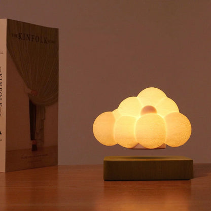 Magnetic Levitation Cloud Lamp floating above base with 3D-printed cloud design