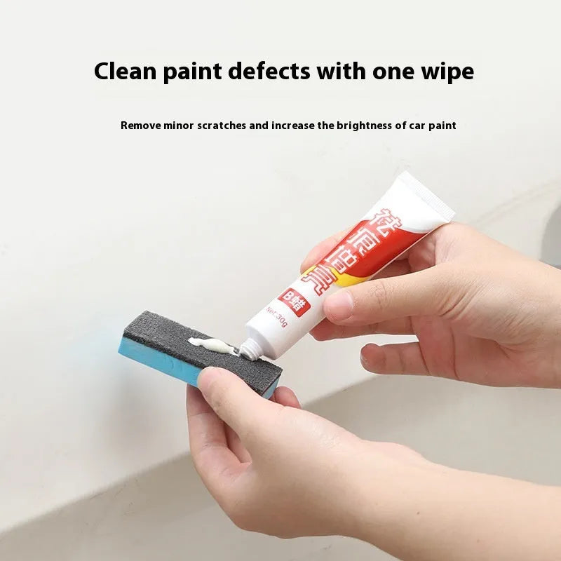Car repair wax kit with bottles of A and B wax and an abrasive sponge mop for scratch removal and polishing.