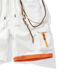 Men's loose-fit cropped bamboo fibre sports shorts in plus sizes on a hanger.