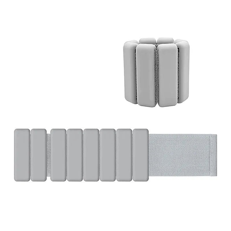 Square silicone iron block weight-bearing bracelet with adjustable velcro in gray on white background