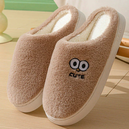 Cozy cartoon slippers with big eyes in various colors, featuring plush material and non-slip rubber soles for comfortable indoor wear