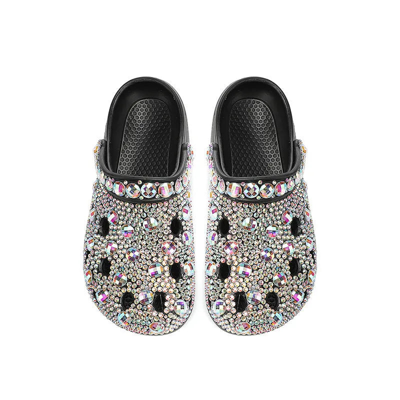 Black women's platform sandals with rhinestone detail on EVA upper and thick sole.
