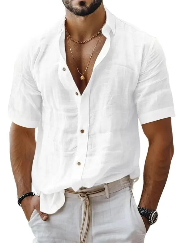 Men's solid colour short sleeve lapel shirt in a cotton linen blend fabric on a hanger.