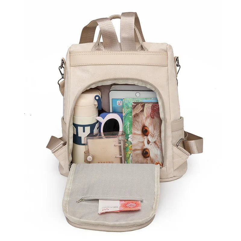 Women's PU leather national style contrast colour backpack with multiple pockets, available in beige, black, blue, dark brown, khaki, and light blue