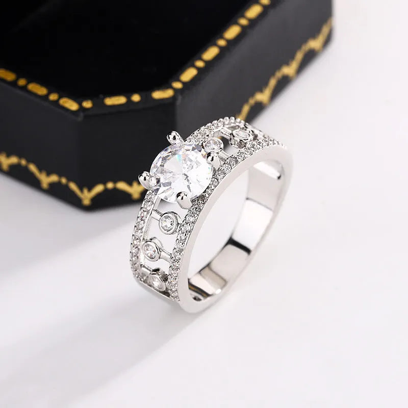 Women's copper hexagon hollow-out anti-moissanite ring in ins style on a plain background