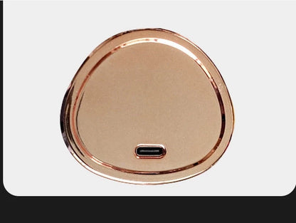 Wireless rechargeable curling iron with automatic rotation in grey, pink, gold, and purple