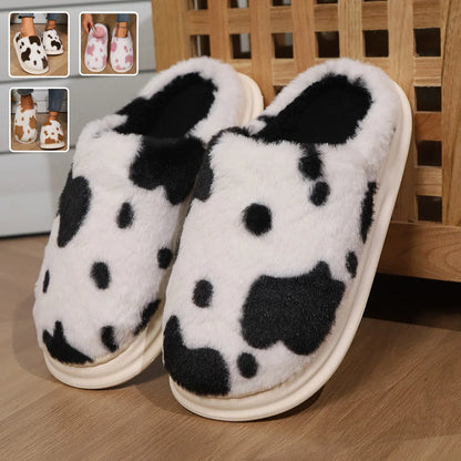 A pair of cozy, plush slippers with a unique spotted pattern, designed for warm and comfortable indoor wear.