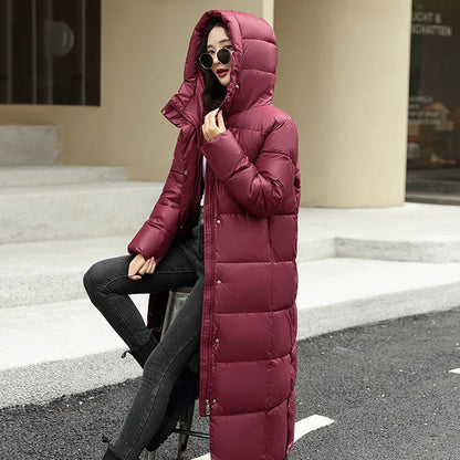 Women's super long winter puffer coat in black, dark red, white, and khaki with hood