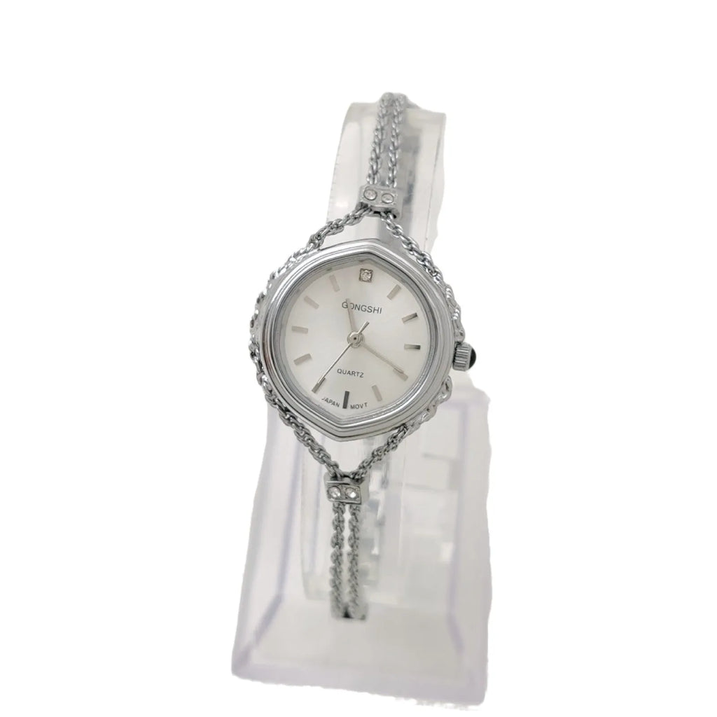 Women's Mori style quartz watch with 25mm dial, 7mm thickness, and chain strap in gold or silver