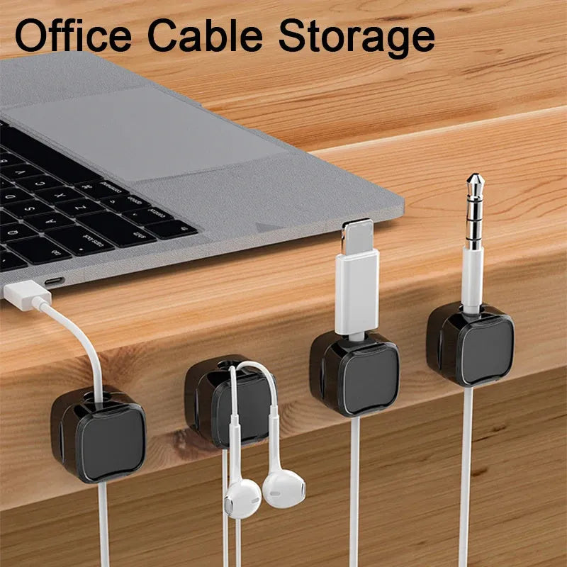 Black and white magnetic cable clips with adhesive backing for under desk wire organisation