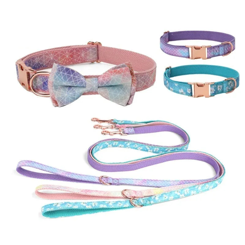 Polyester pet collar with rose gold metal buckle and attached decorative bow in cherry blossom blue colour