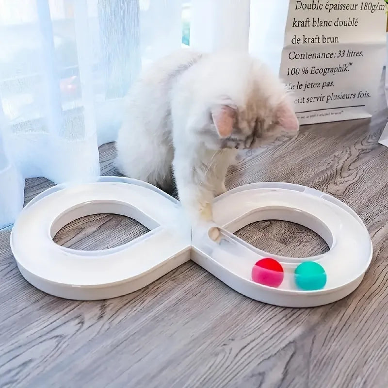 Blue interactive cat play track with turntable ball and four toy attachments on a white background.