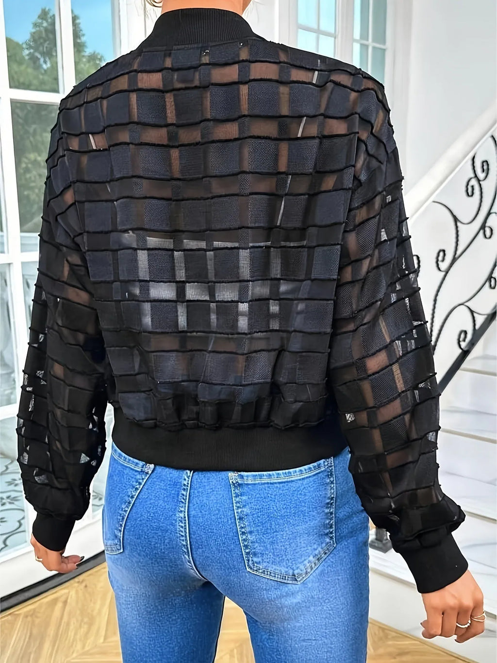 Black semi-transparent women's casual jacket with geometric pattern and front zipper closure