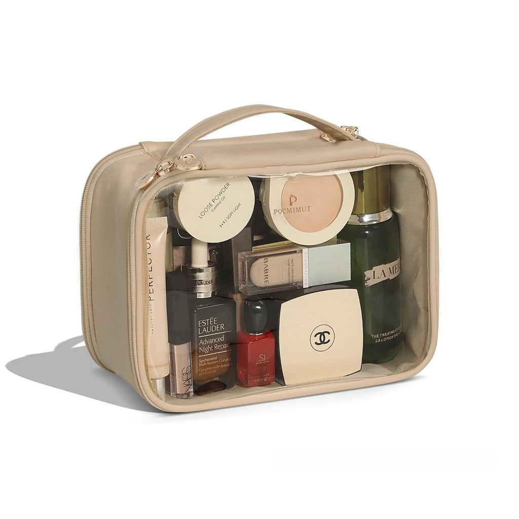 Clear PVC cosmetic bag with a zip open, showing a polyester lining and separate compartments.