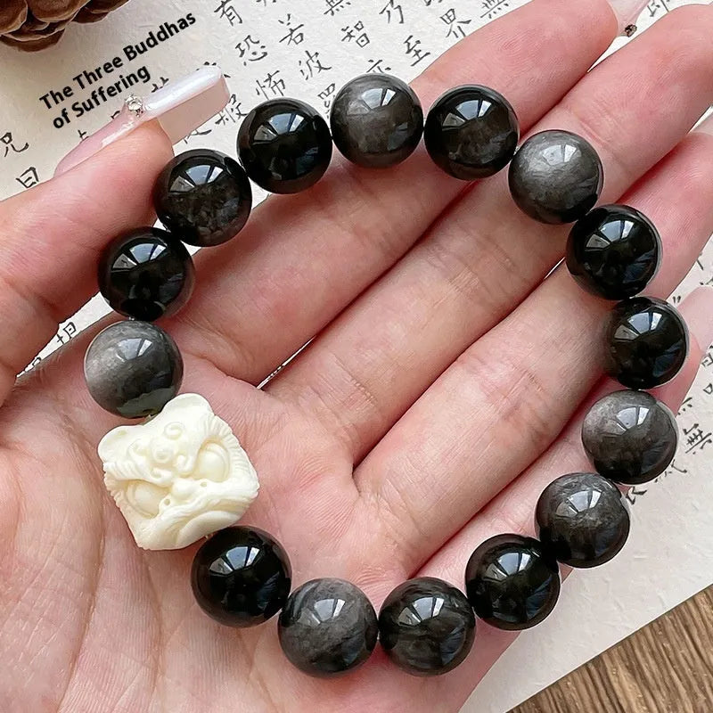 Obsidian prayer beads bracelet with manual processing and chamfered square grain details
