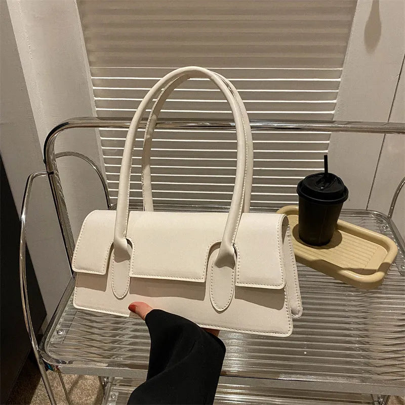 Women's small square shoulder bag in PU leather with single strap and document compartment interior