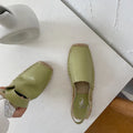 Women's beige retro fisherman flat sandals with canvas and soft leather upper on a flat sole.