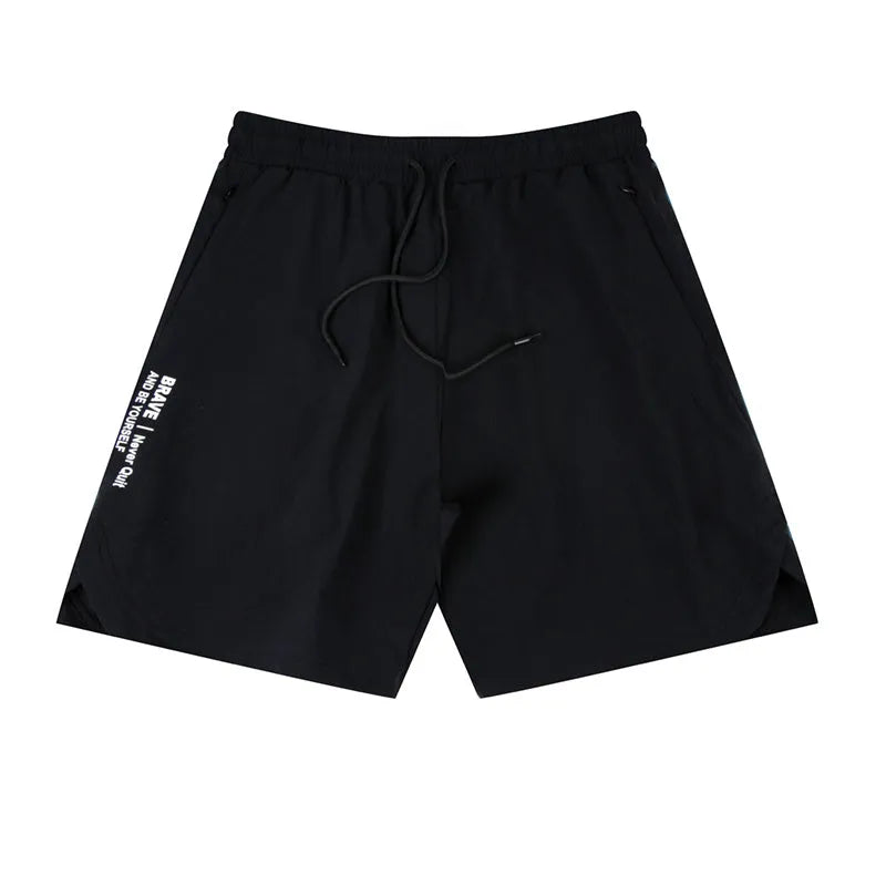 Men's black quick-dry running shorts made of nylon and spandex on a grey background