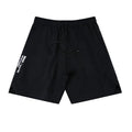 Men's black quick-dry running shorts made of nylon and spandex on a grey background