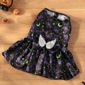 Orange Halloween dog costume with angel wings and a halo, featuring a bright pumpkin print design.