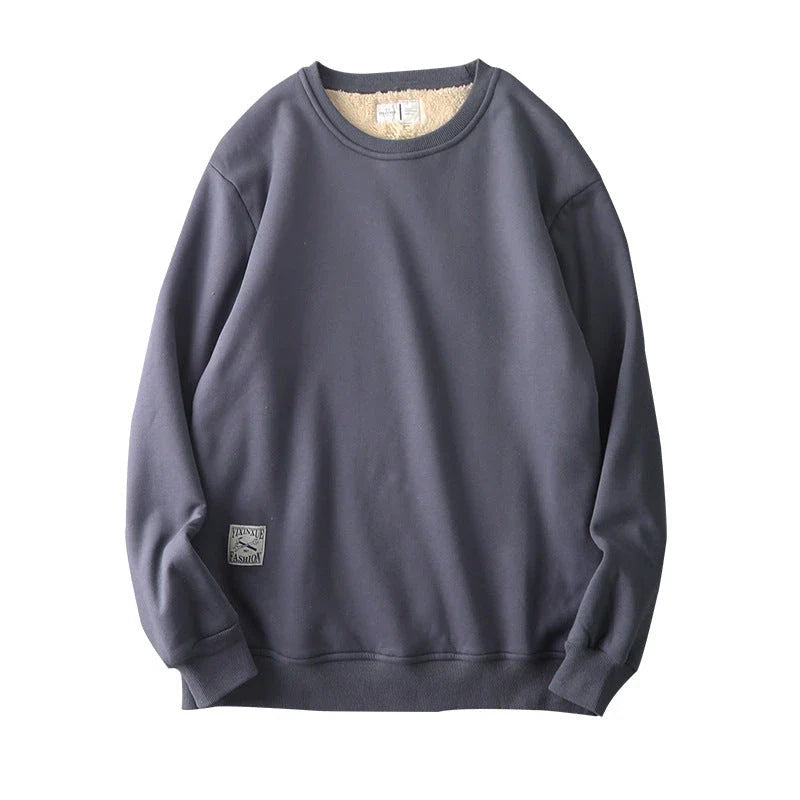 Cozy fleece pullover in various colors for men, featuring a round neckline and long sleeves for warmth and style