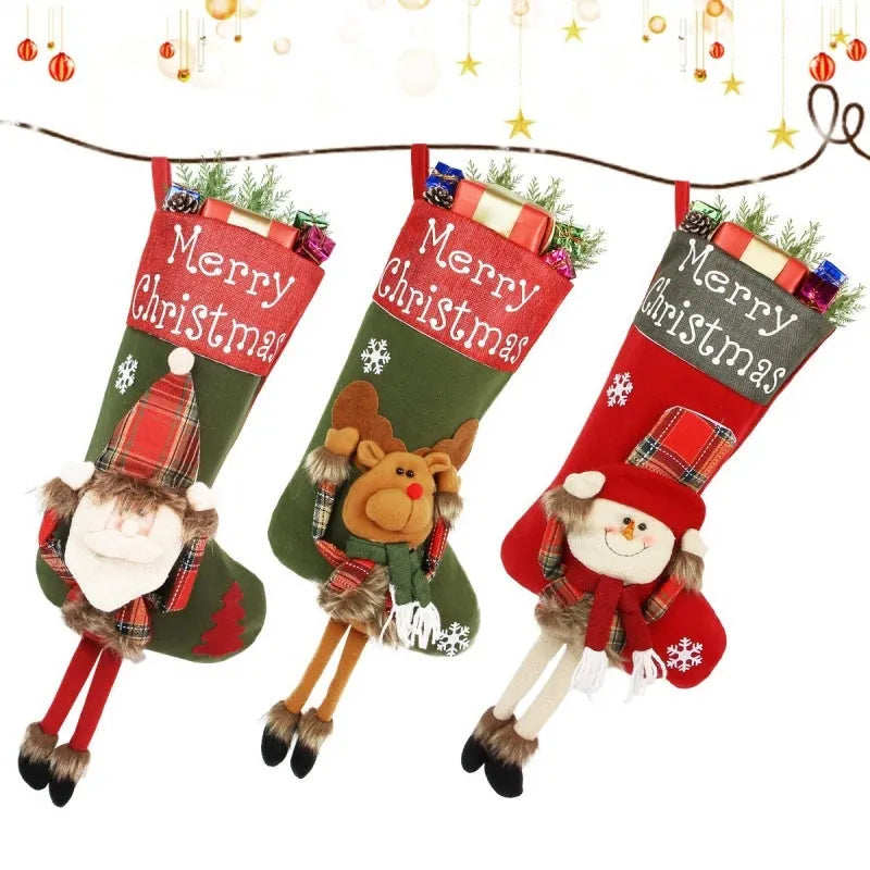 Three large Christmas stockings with Santa, Snowman, and Reindeer 3D applique designs hanging from a mantel